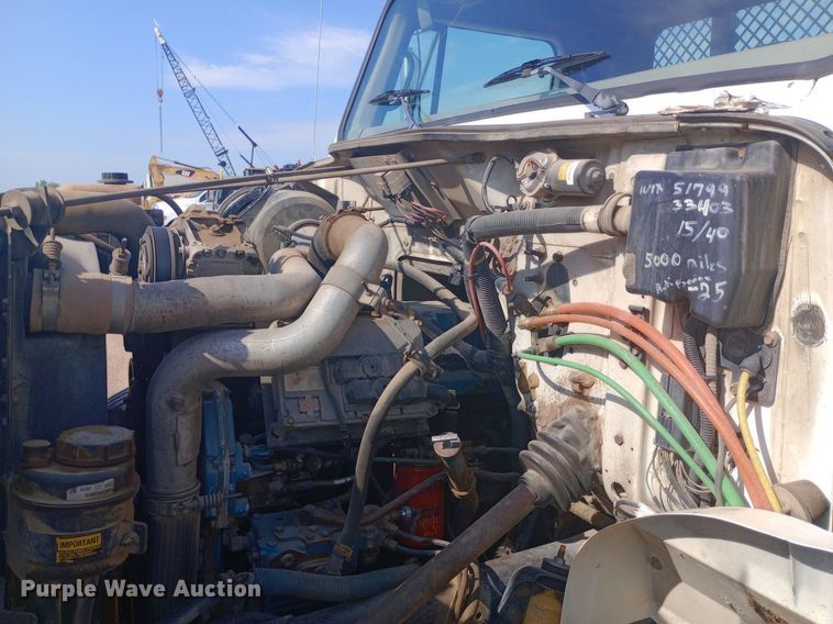 image for item NY9346 1999 International  4700 dump flatbed truck