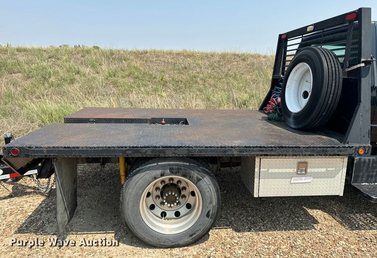 image for item DQ6910 2002 Chevrolet C6500 Crew Cab flatbed truck