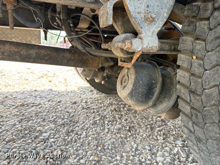 image for item DQ6910 2002 Chevrolet C6500 Crew Cab flatbed truck