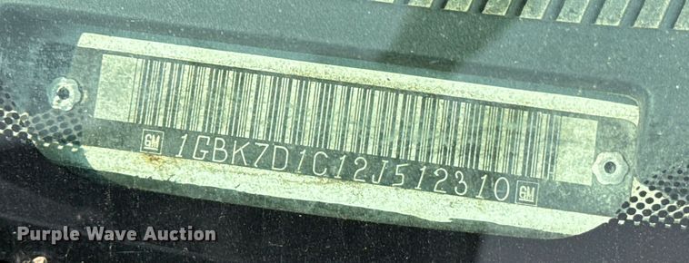 image for item DQ6910 2002 Chevrolet C6500 Crew Cab flatbed truck