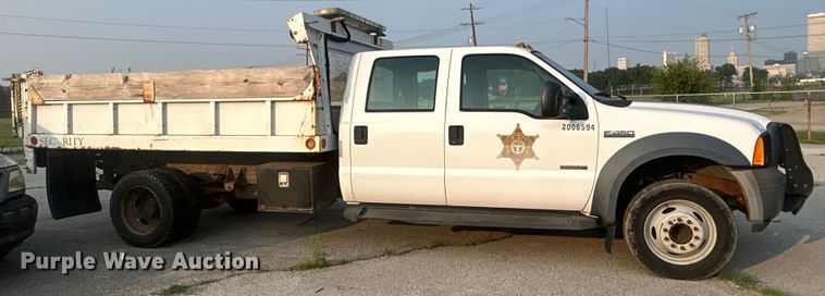 image for item EG0557 2006 Ford F450 Super Duty Crew Cab dump flatbed truck