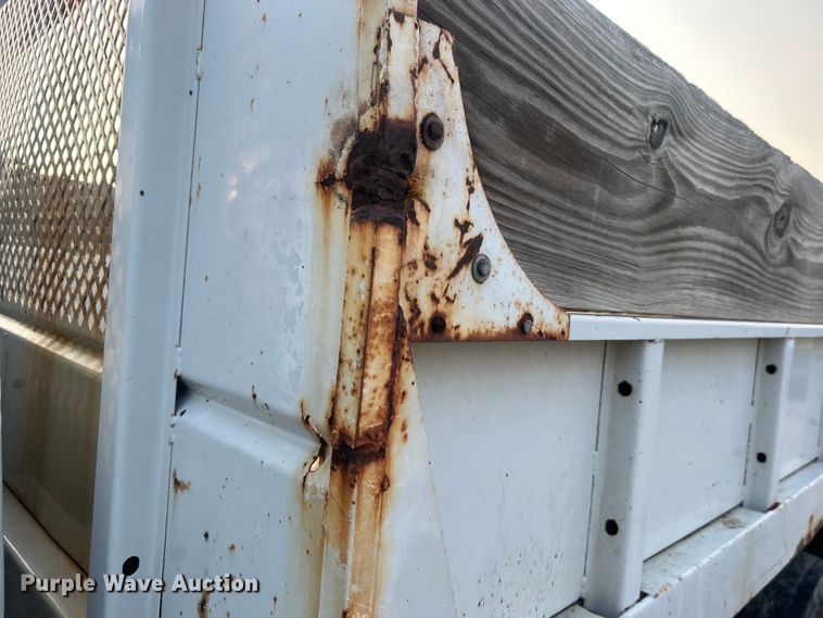 image for item EG0557 2006 Ford F450 Super Duty Crew Cab dump flatbed truck