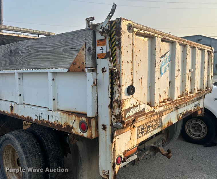 image for item EG0557 2006 Ford F450 Super Duty Crew Cab dump flatbed truck