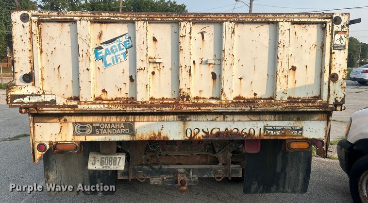 image for item EG0557 2006 Ford F450 Super Duty Crew Cab dump flatbed truck