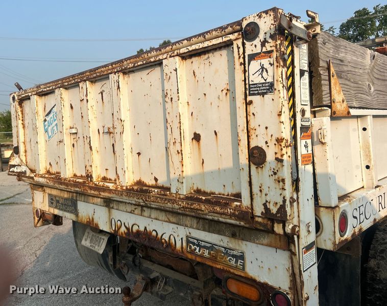 image for item EG0557 2006 Ford F450 Super Duty Crew Cab dump flatbed truck