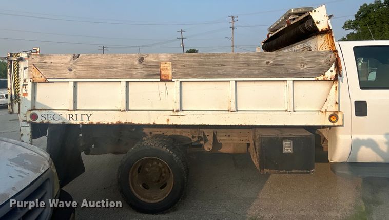 image for item EG0557 2006 Ford F450 Super Duty Crew Cab dump flatbed truck