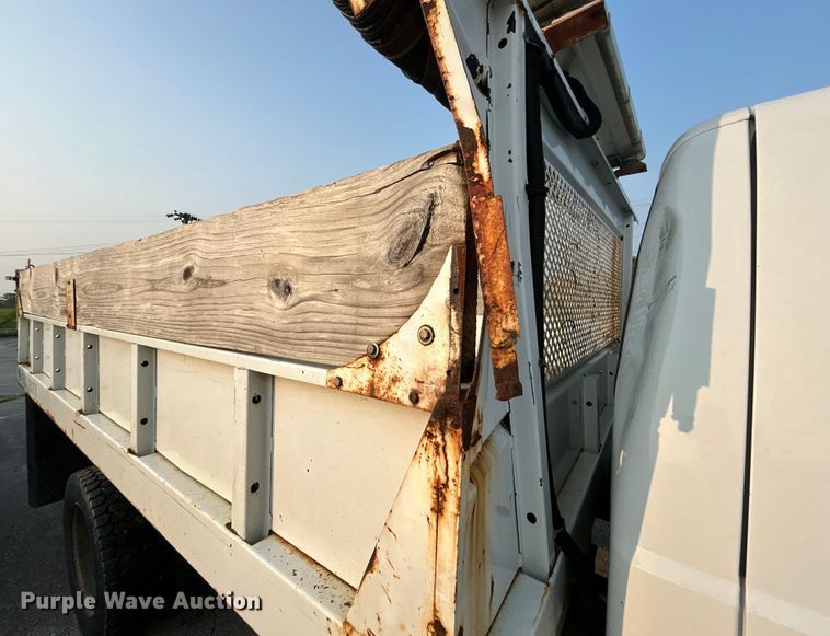 image for item EG0557 2006 Ford F450 Super Duty Crew Cab dump flatbed truck