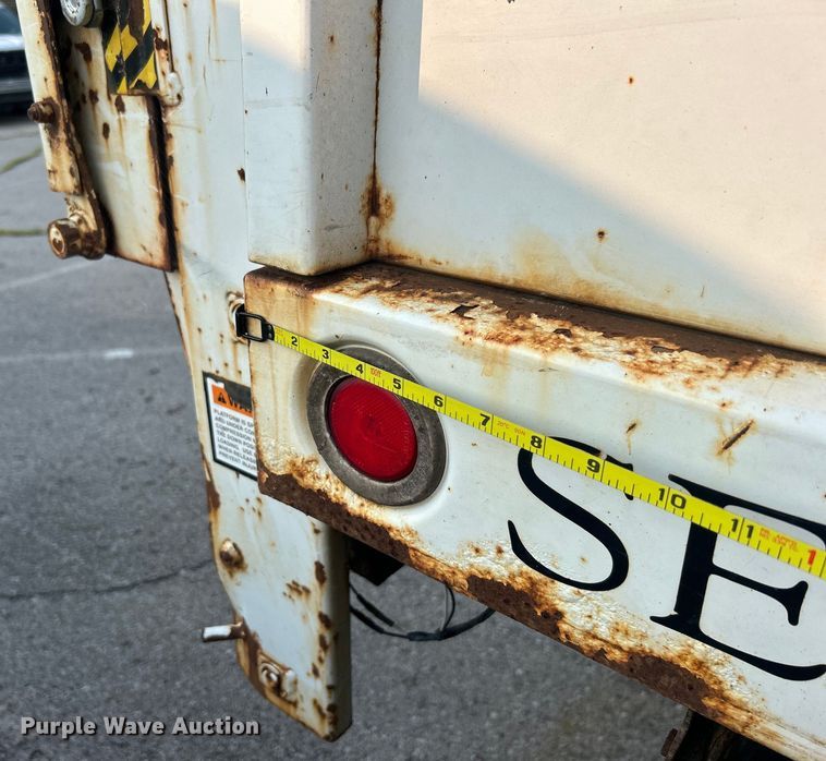 image for item EG0557 2006 Ford F450 Super Duty Crew Cab dump flatbed truck