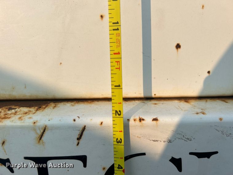 image for item EG0557 2006 Ford F450 Super Duty Crew Cab dump flatbed truck