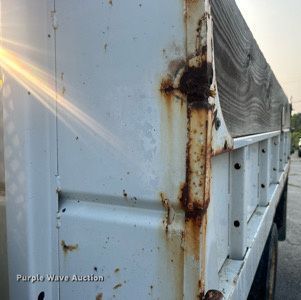 image for item EG0557 2006 Ford F450 Super Duty Crew Cab dump flatbed truck