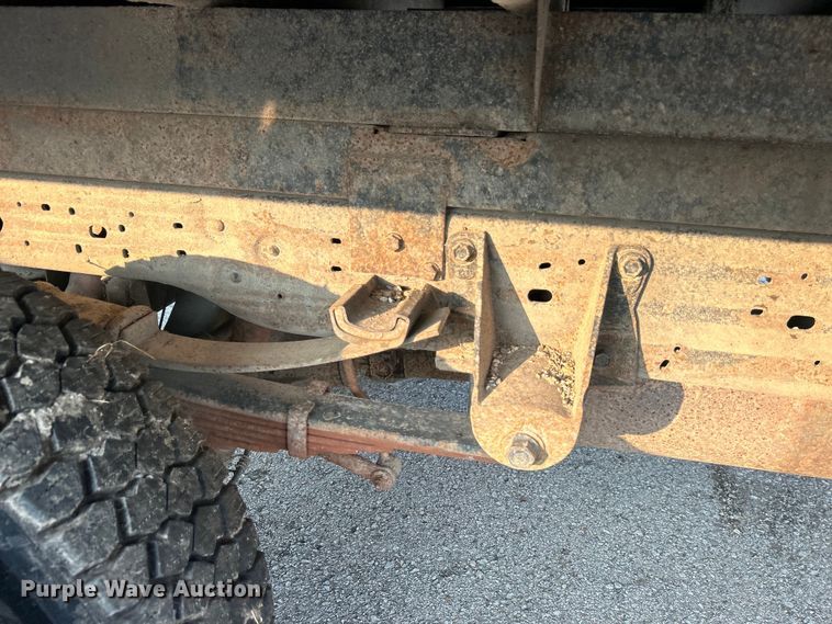 image for item EG0557 2006 Ford F450 Super Duty Crew Cab dump flatbed truck