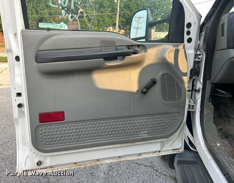 image for item EG0557 2006 Ford F450 Super Duty Crew Cab dump flatbed truck