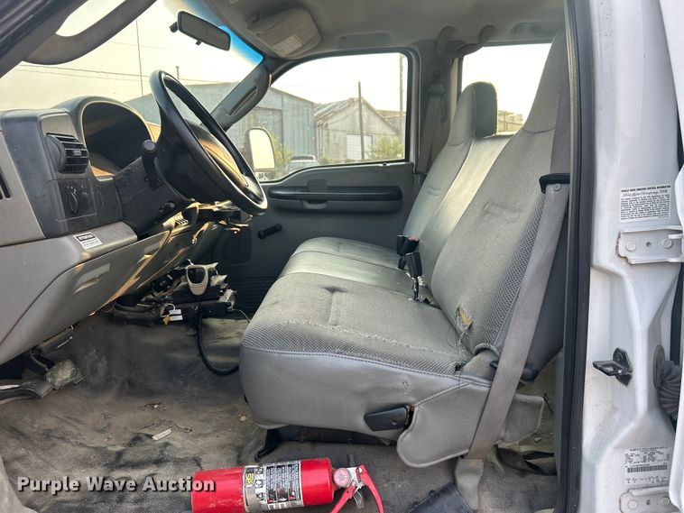 image for item EG0557 2006 Ford F450 Super Duty Crew Cab dump flatbed truck