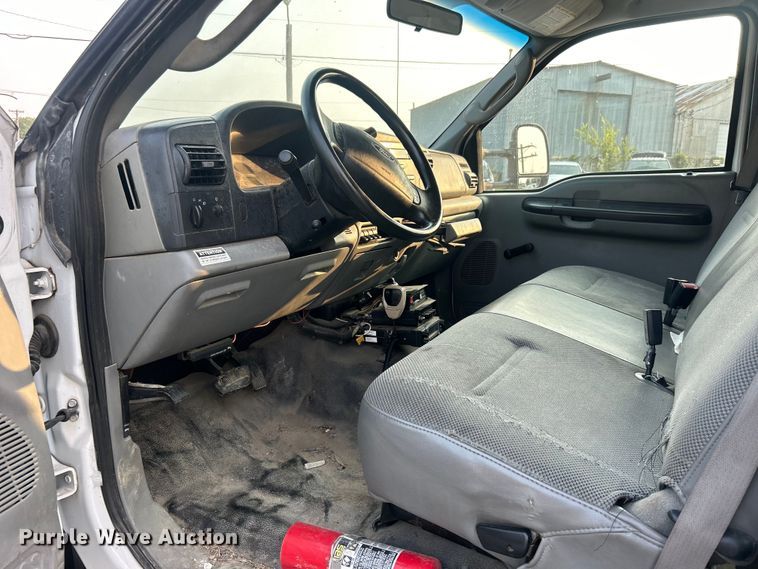 image for item EG0557 2006 Ford F450 Super Duty Crew Cab dump flatbed truck