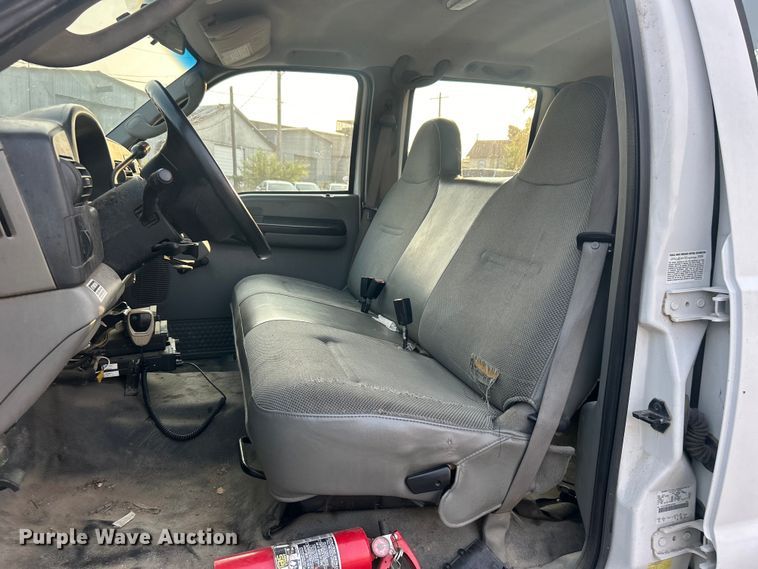 image for item EG0557 2006 Ford F450 Super Duty Crew Cab dump flatbed truck