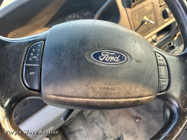 image for item EG0557 2006 Ford F450 Super Duty Crew Cab dump flatbed truck