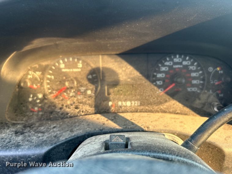 image for item EG0557 2006 Ford F450 Super Duty Crew Cab dump flatbed truck