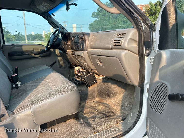 image for item EG0557 2006 Ford F450 Super Duty Crew Cab dump flatbed truck