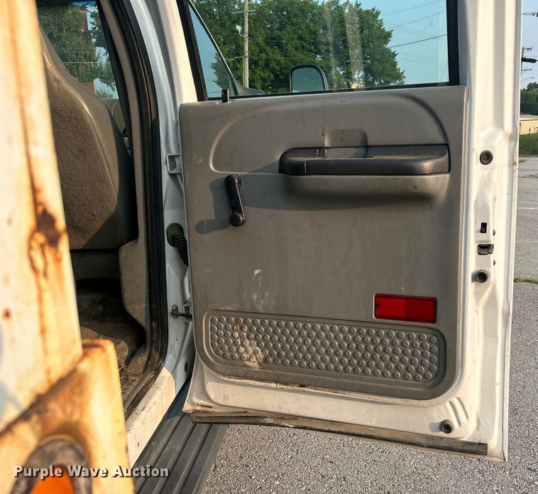 image for item EG0557 2006 Ford F450 Super Duty Crew Cab dump flatbed truck