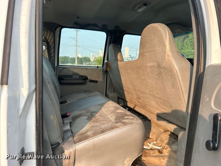 image for item EG0557 2006 Ford F450 Super Duty Crew Cab dump flatbed truck