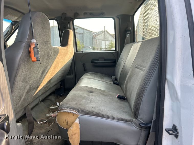 image for item EG0557 2006 Ford F450 Super Duty Crew Cab dump flatbed truck