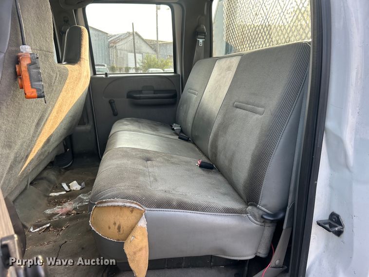 image for item EG0557 2006 Ford F450 Super Duty Crew Cab dump flatbed truck