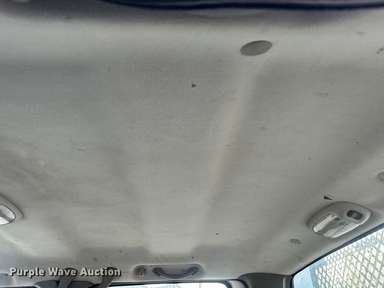 image for item EG0557 2006 Ford F450 Super Duty Crew Cab dump flatbed truck