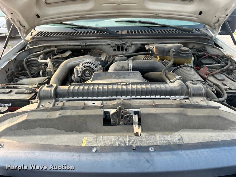 image for item EG0557 2006 Ford F450 Super Duty Crew Cab dump flatbed truck