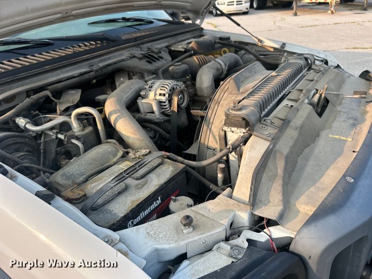 image for item EG0557 2006 Ford F450 Super Duty Crew Cab dump flatbed truck