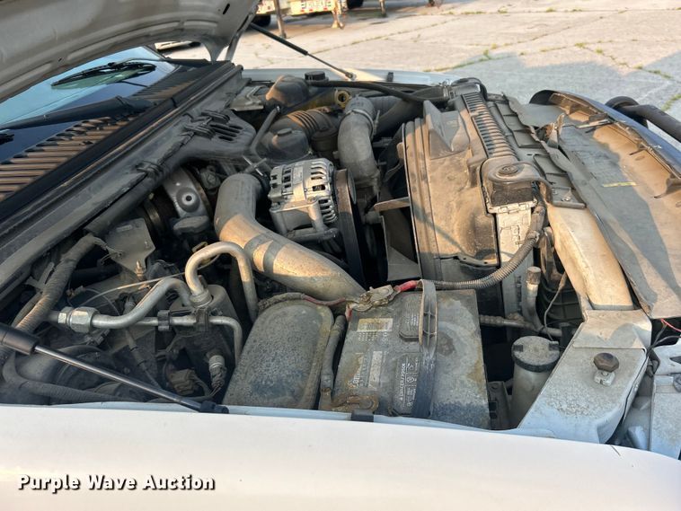 image for item EG0557 2006 Ford F450 Super Duty Crew Cab dump flatbed truck