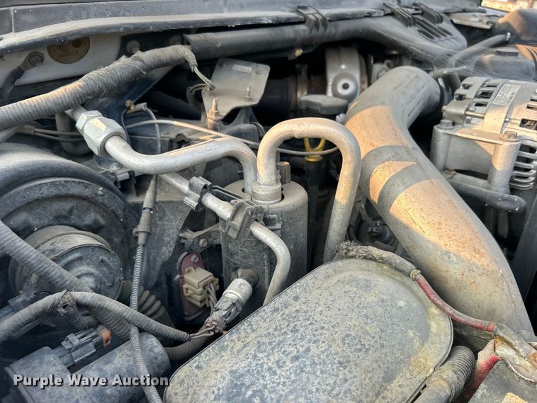 image for item EG0557 2006 Ford F450 Super Duty Crew Cab dump flatbed truck