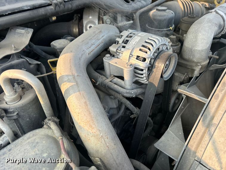 image for item EG0557 2006 Ford F450 Super Duty Crew Cab dump flatbed truck