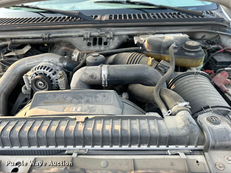 image for item EG0557 2006 Ford F450 Super Duty Crew Cab dump flatbed truck