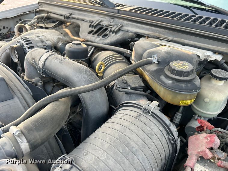 image for item EG0557 2006 Ford F450 Super Duty Crew Cab dump flatbed truck