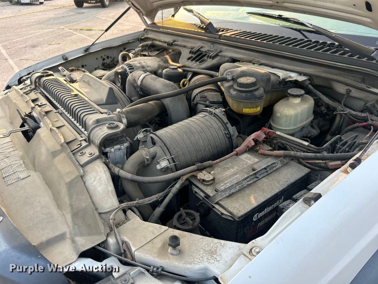 image for item EG0557 2006 Ford F450 Super Duty Crew Cab dump flatbed truck