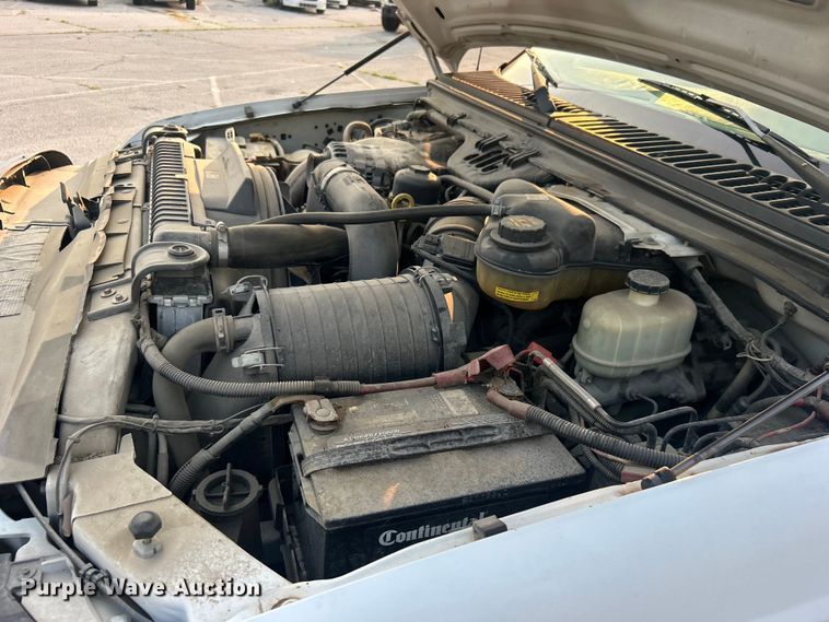 image for item EG0557 2006 Ford F450 Super Duty Crew Cab dump flatbed truck