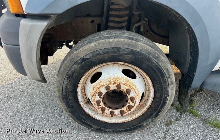 image for item EG0557 2006 Ford F450 Super Duty Crew Cab dump flatbed truck