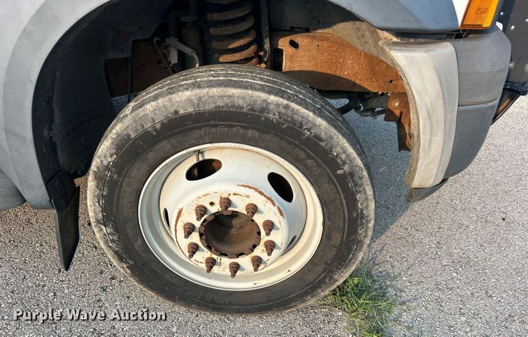 image for item EG0557 2006 Ford F450 Super Duty Crew Cab dump flatbed truck