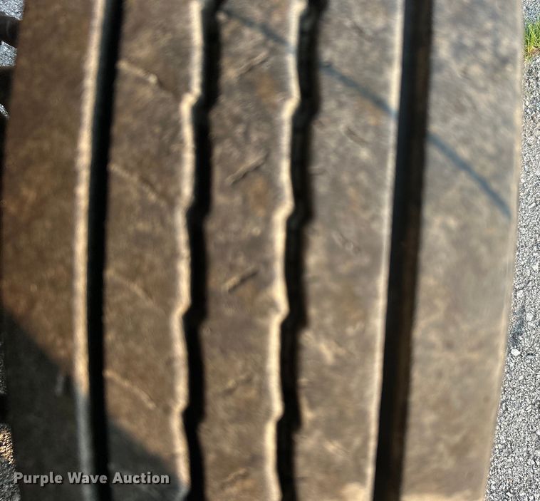 image for item EG0557 2006 Ford F450 Super Duty Crew Cab dump flatbed truck