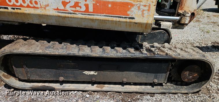 image for item EI8192 1993 Bobcat X231 mini excavator