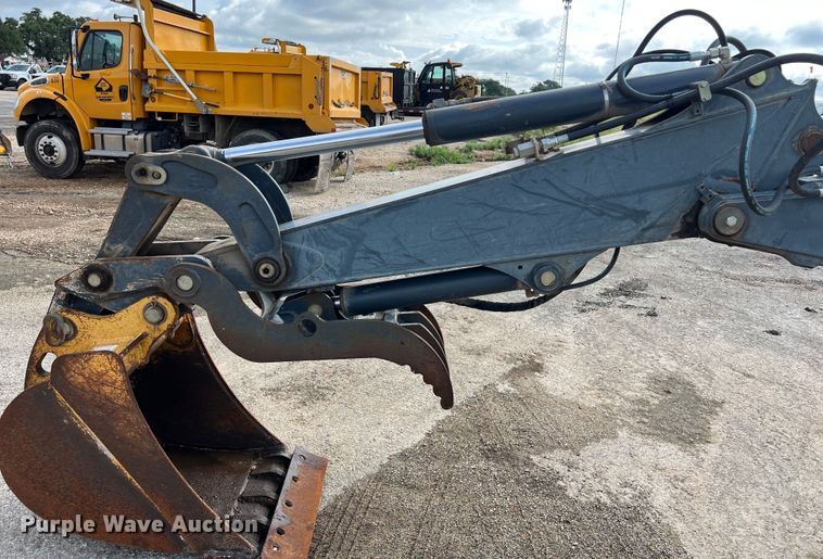 image for item EJ2843 2012 John Deere  310SK backhoe