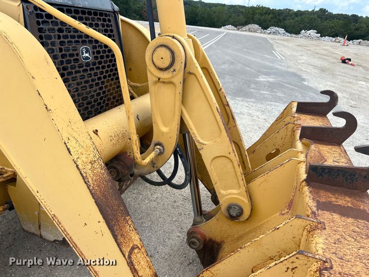 image for item EK3018 2005 John Deere  710G backhoe