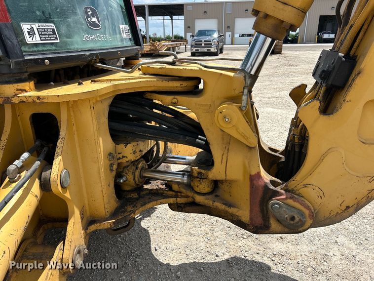 image for item EK3018 2005 John Deere  710G backhoe