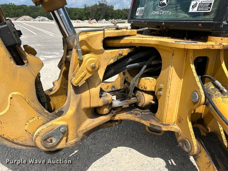 image for item EK3018 2005 John Deere  710G backhoe