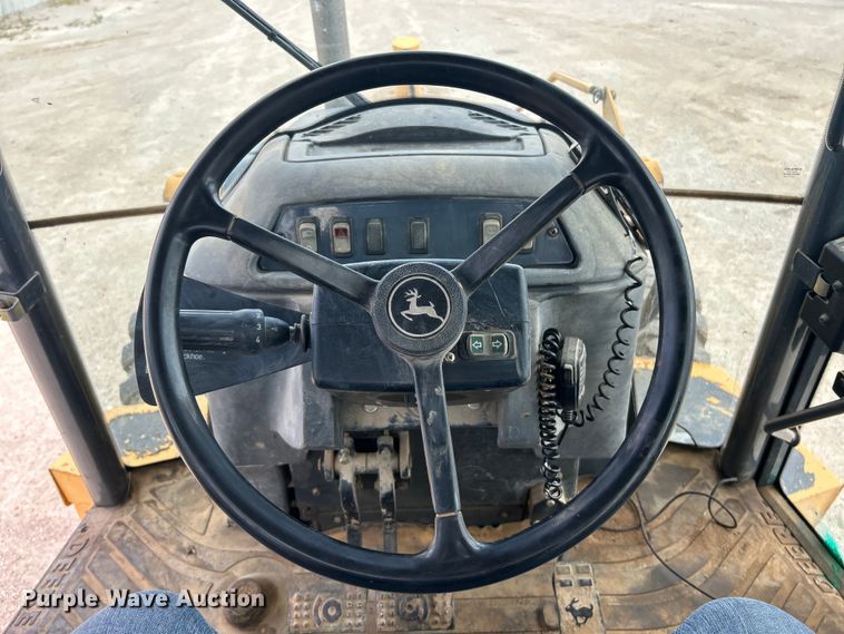 image for item EK3018 2005 John Deere  710G backhoe