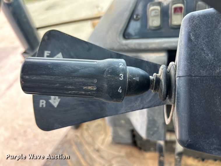 image for item EK3018 2005 John Deere  710G backhoe