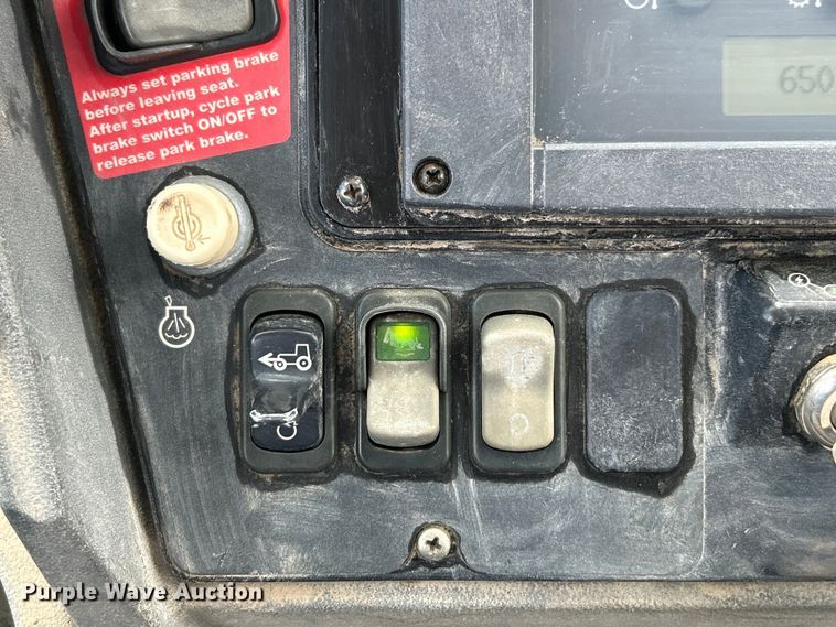 image for item EK3018 2005 John Deere  710G backhoe