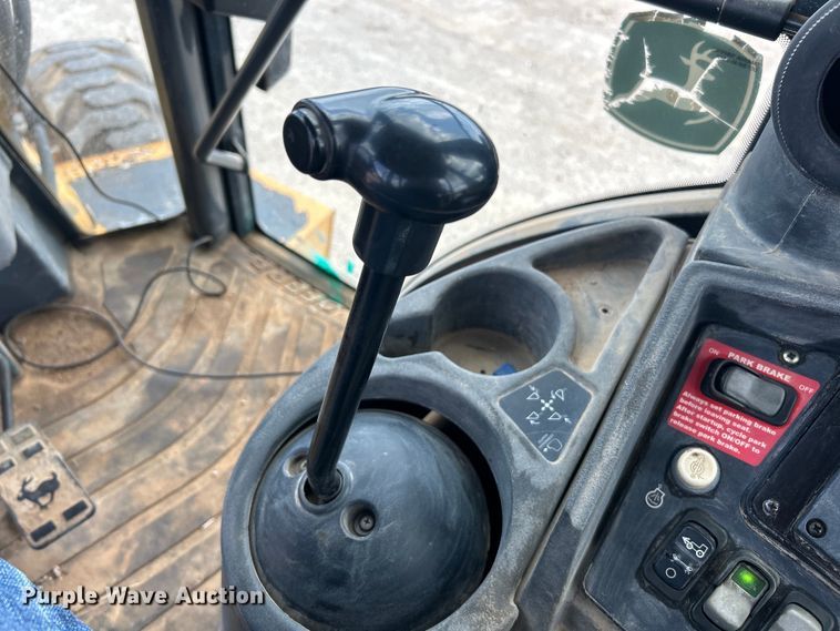 image for item EK3018 2005 John Deere  710G backhoe