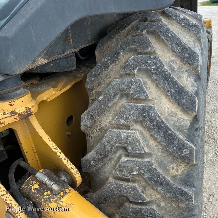 image for item EK3018 2005 John Deere  710G backhoe