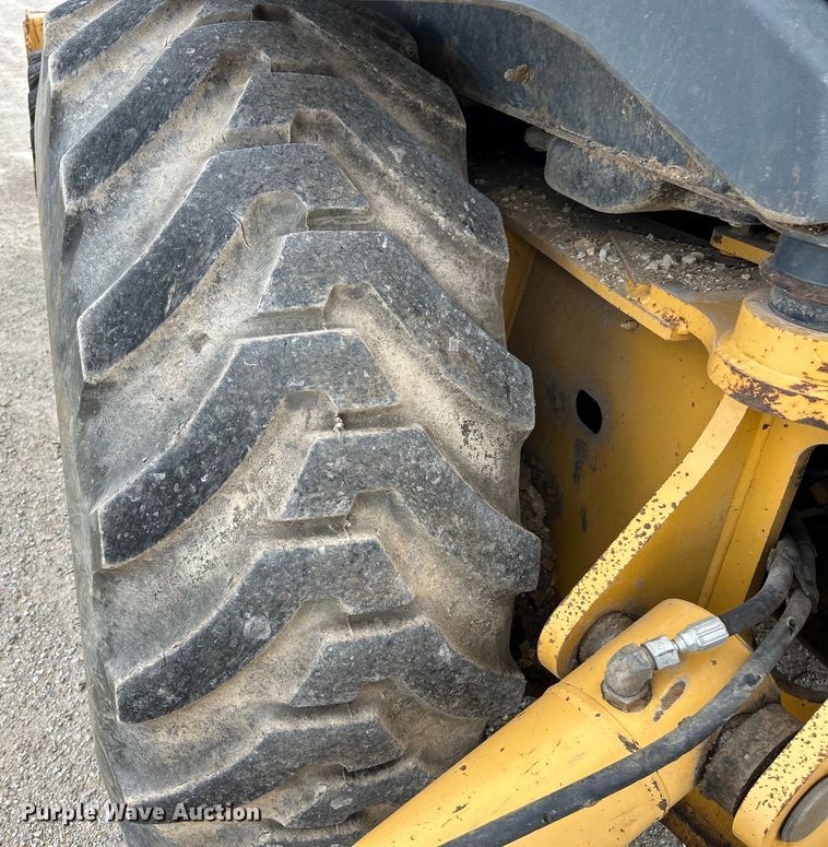 image for item EK3018 2005 John Deere  710G backhoe